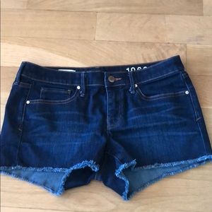 Dark blue denim cut off shorts